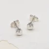 Dainty Diamond Heart Stud Earrings - Image 3